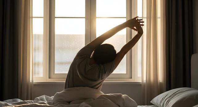 Peaceful morning scene with person stretching by window